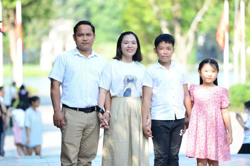 Gia đình chị Lê Thị Hạnh và anh Nguyễn Xuân Đang. Ảnh: GĐCC