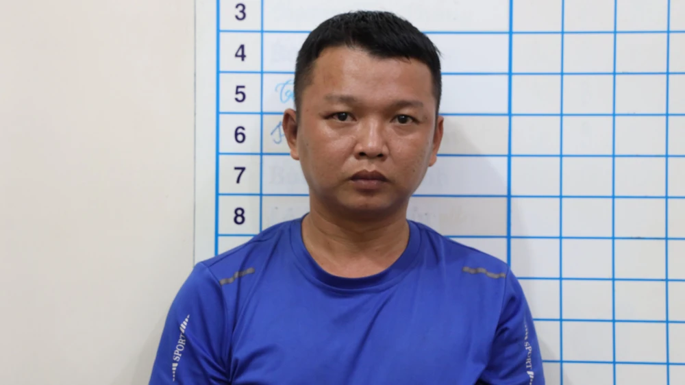 Nguyễn Thành Luân bị bắt giữ. Ảnh: VÕ TÙNG