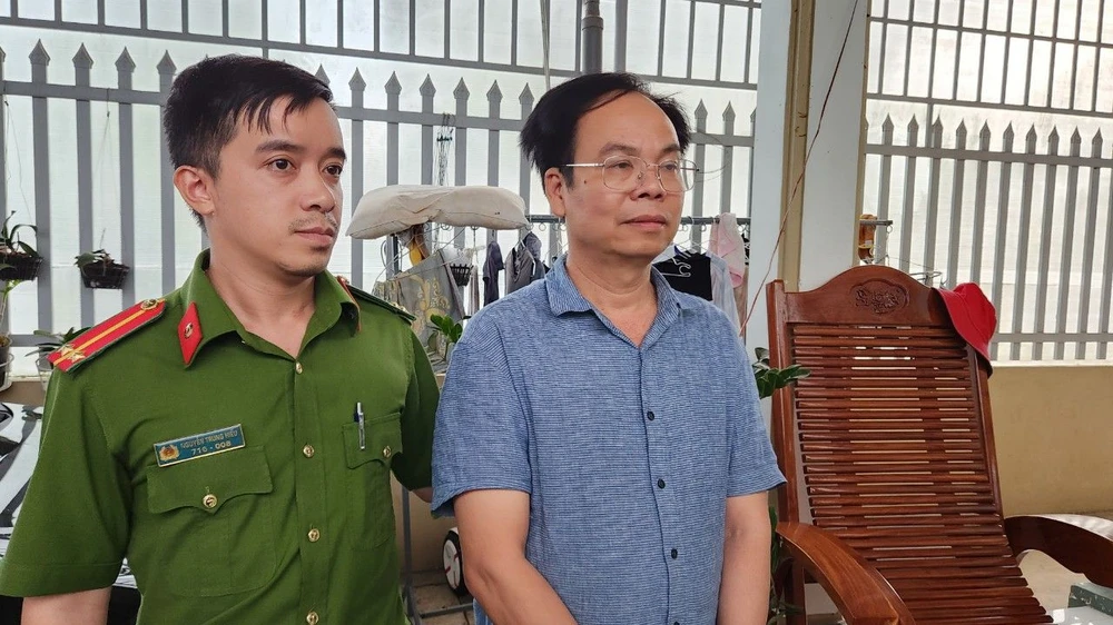 Ông Vũ Chí Hữu bị bắt. Ảnh: VÕ TÙNG