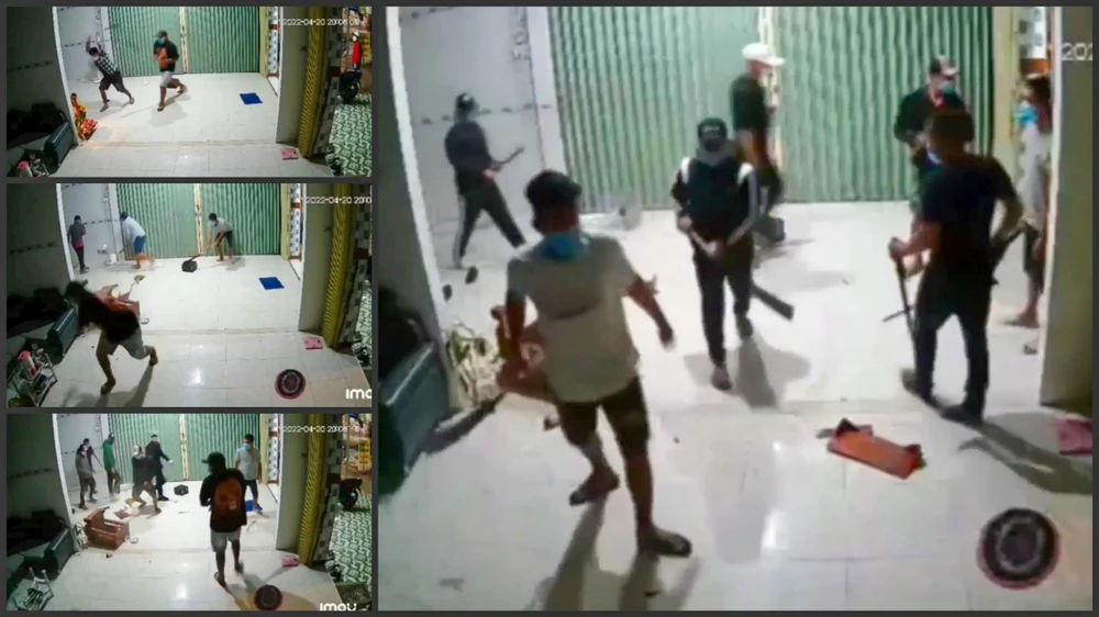 Nhóm người đập phá nhà dân ở thị trấn Sóc Sơn, huyện Hòn Đất, tỉnh Kiên Giang đã được camera an ninh trong nhà ghi lại sự việc. Ảnh cắt từ clip.