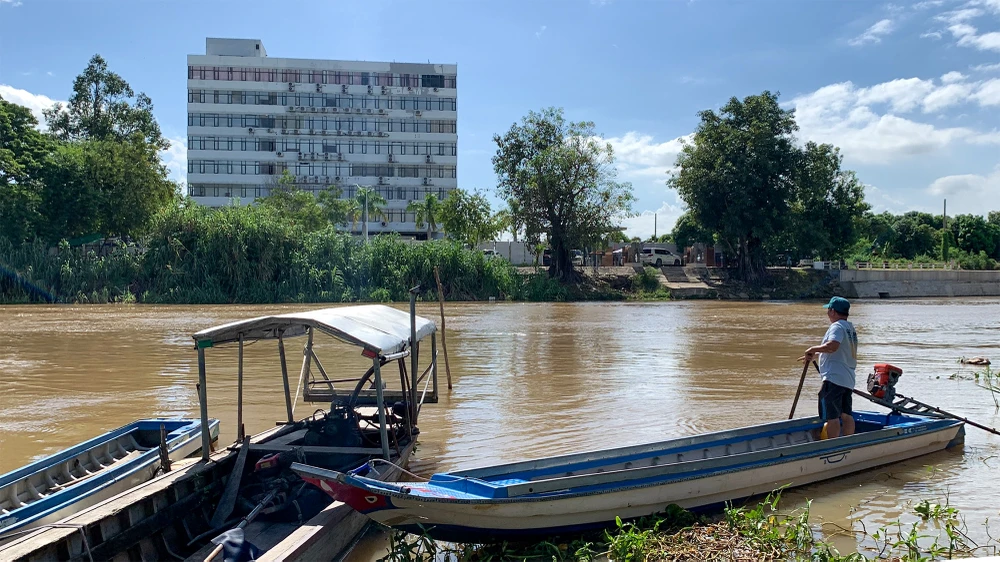 Sông Bình Di (tỉnh An Giang), xảy ra vụ 40 người xông ra từ casino ở Campuchia, rồi lao thẳng xuống sông liều mạng bơi về bờ Việt Nam hồi tháng 8-2022. Ảnh: HẢI DƯƠNG