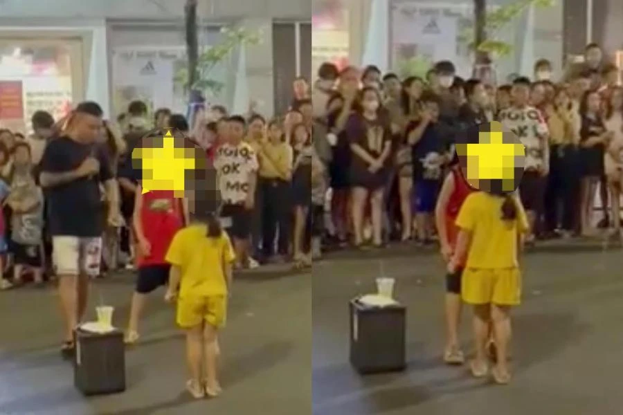 Đưa trẻ em ra ghép đôi ở phố đi bộ TP Vinh gây phản cảm. Ảnh cắt từ video clip.