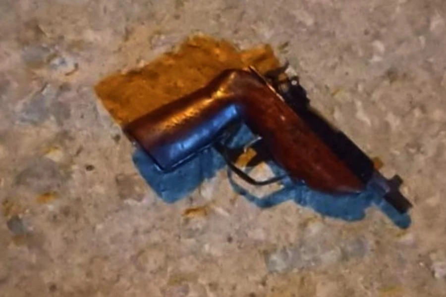 Tang vật khẩu súng tự chế thu giữ của Nguyễn Tất Thảo. Ảnh: CA.