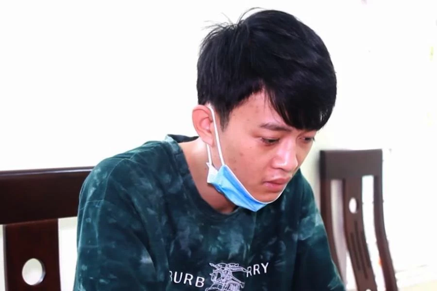 Lương Văn Quân tại cơ quan công an.