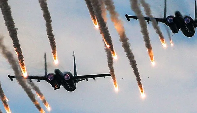 Máy bay của các lực lượng Moscow không kích vào các điểm dân cư tại chiến trường Donetsk ngày 14-12. ẢNH: UKRINFORM