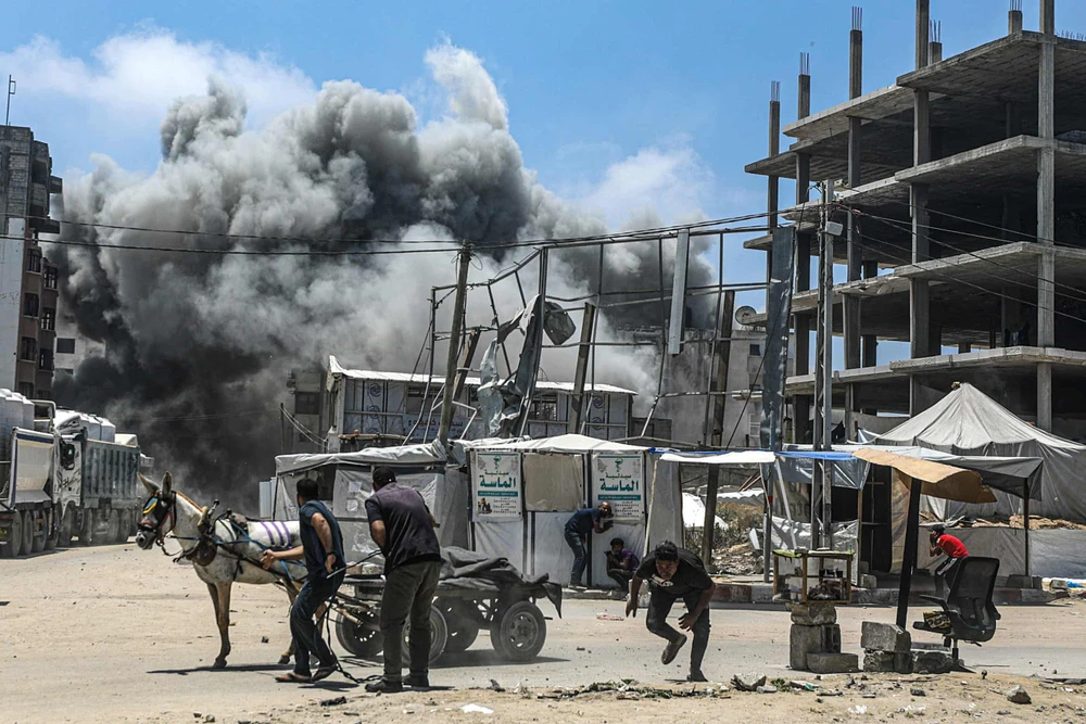 Gaza quặn mình giữa máu lửa, đau thương