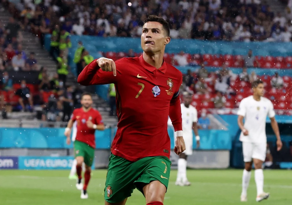 Ronaldo lên ngôi đồng Vua phá lưới Euro 2021 và khao khát cùng tuyển Bồ Đào Nha giành ngôi vô địch cúp thế giới 2022. Ảnh: GETTY.
