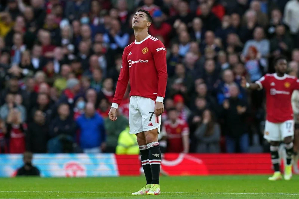 ... trong khi chân sút Ronaldo không có nhiều hạnh phúc tại Man United. Ảnh: GETTY.
