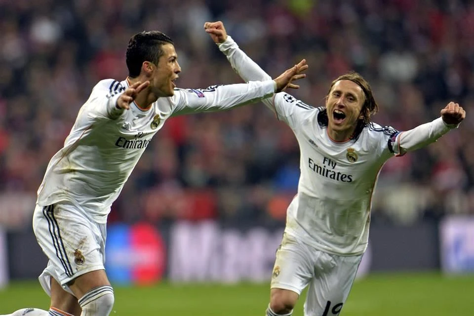 Modric và Ronaldo từng chơi với nhau hơn 200 trận khi khoác áo Real Madrid. Ảnh: GETTY.