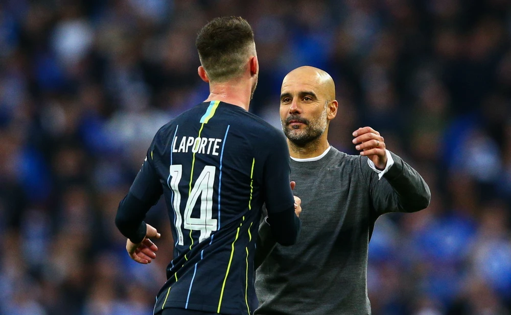 HLV Pep Guardiola không còn ưu tiên Laporte ở tuyến phòng ngự của Man City. Ảnh: GETTY.