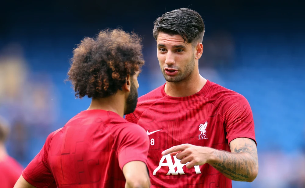 Đồng đội mới Szoboszlai khẳng định đàn anh Salah sẽ không đi đâu cả. Ảnh: GETTY.