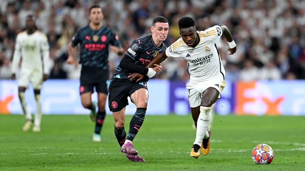 hlv-pep-guardiola-va-cuoc-dai-chien-real-madrid-dinh-doat-mua-giai (1).jpg