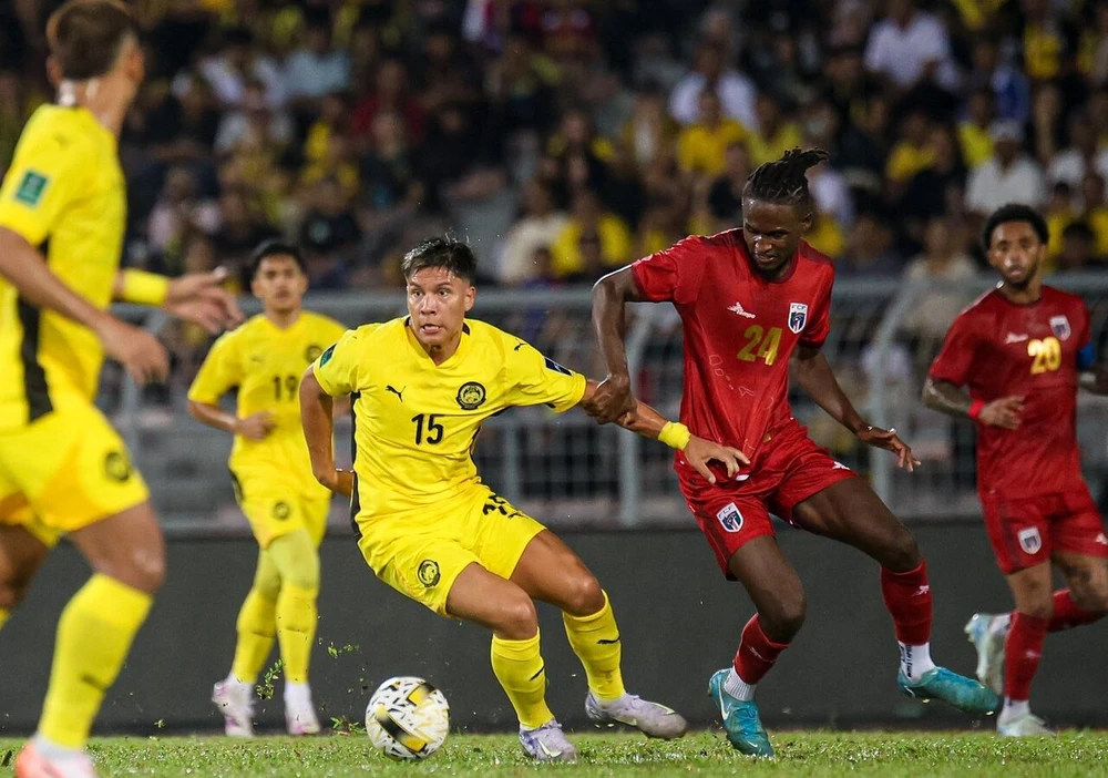 malaysia-de-chung-suc-manh-cua-hlv-kim-sang-sik (2).jpg