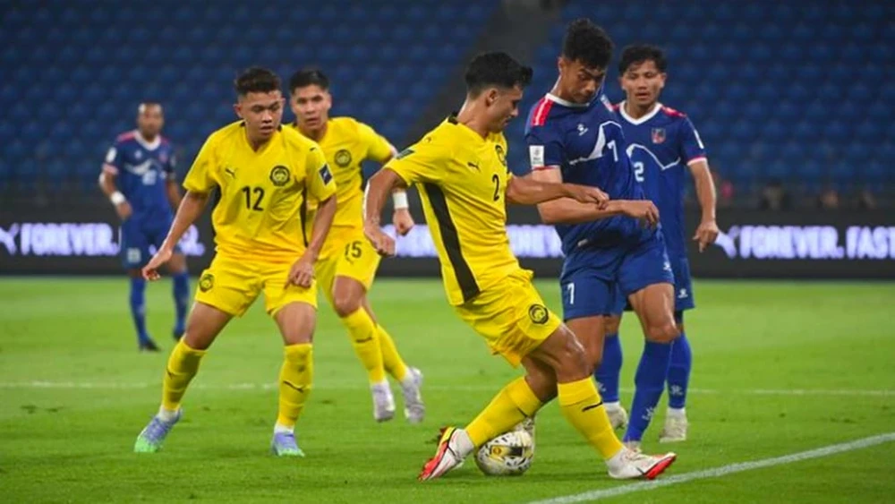 doi-tuyen-viet-nam-thang-nguoc-3-0-tu-lenh-trung-phat-cua-fifa-voi-bong-da-malaysia (1).jpg