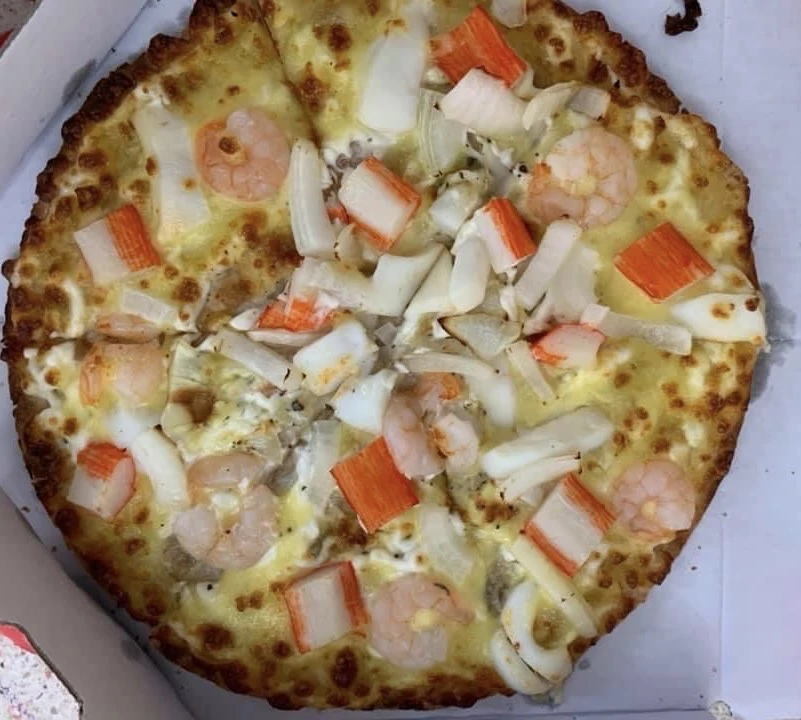 Hạn chế ăn gà rán, khoai tây chiên, pizza vì nó không chỉ chứa nhiều hương vị mà còn gây nghiện. Ảnh: PHƯƠNG LÊ.