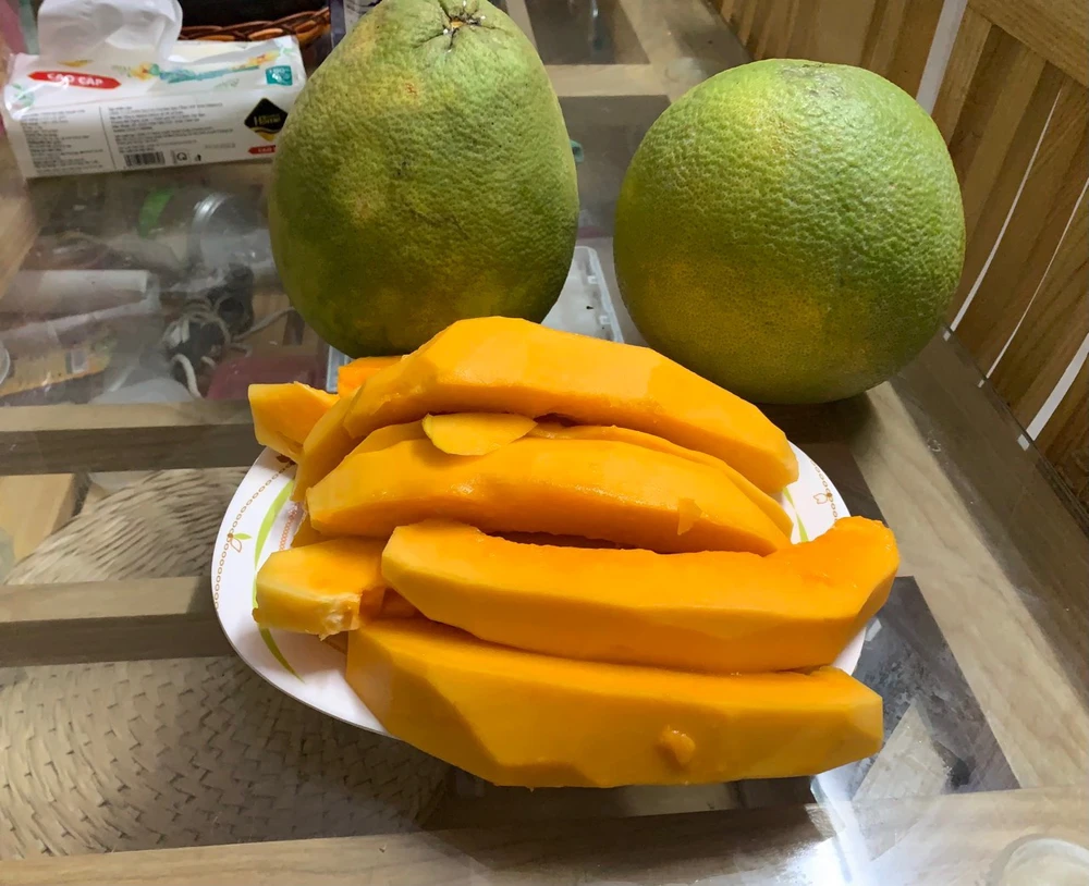 Đu đủ là một nguồn giàu enzym hỗ trợ tiêu hóa. Ảnh: PHƯƠNG LÊ.