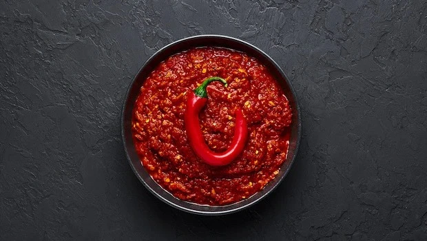 Các bữa ăn cay, nóng có thể làm trầm trọng thêm vết loét miệng. Ảnh: Istock. Các bữa ăn cay, nóng có thể làm trầm trọng thêm vết loét miệng. Ảnh: Istock.