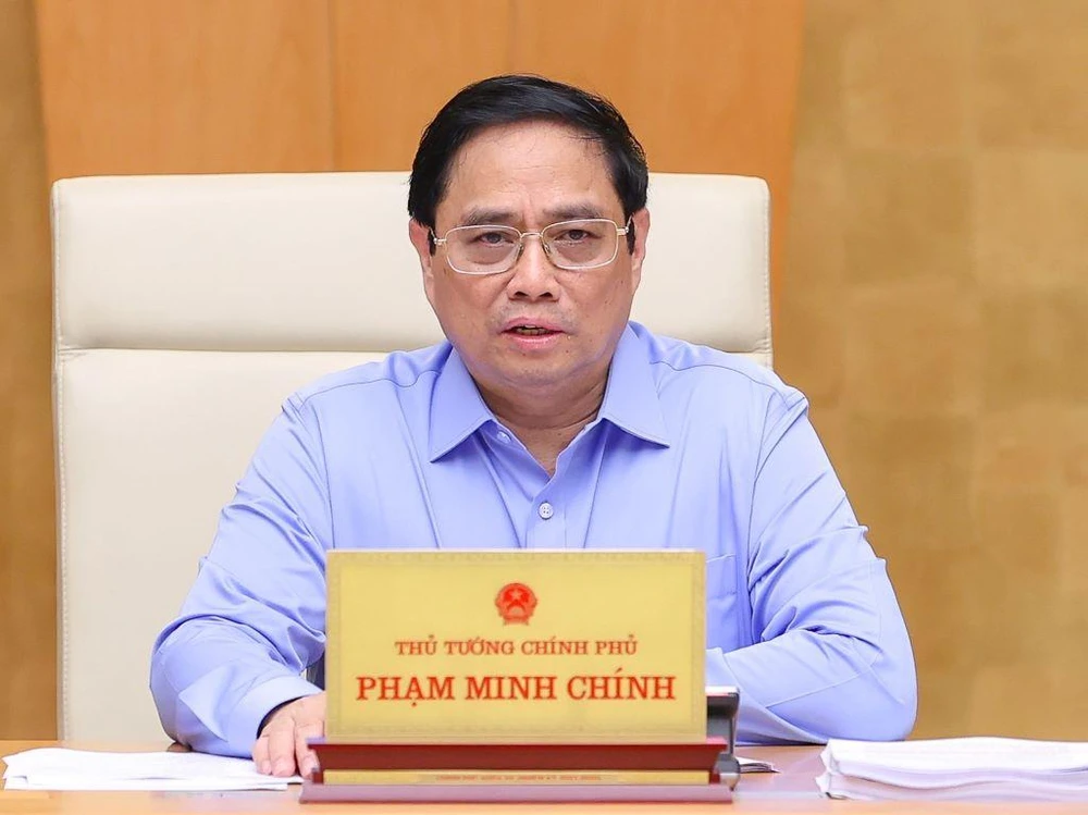 Thủ tướng Phạm Minh Chính chủ trì phiên họp chuyên đề pháp luật tháng 8-2022 của Chính phủ. Ảnh: VGP