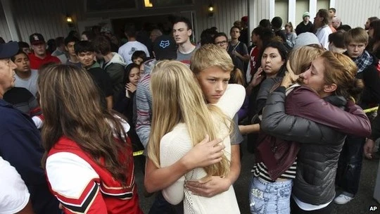 The students embraced after they evacuated the school