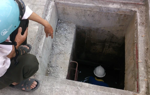 Cống đầy nước mà anh Thành bị lọt xuống. Ảnh: An Nhơn