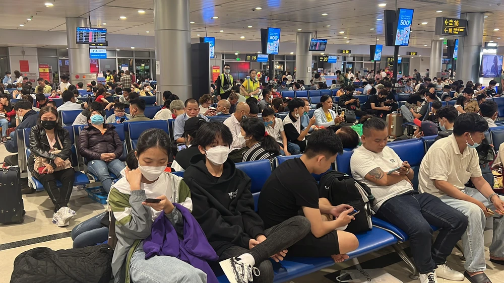 Sân bay Tân Sơn Nhất đạt kỷ lục về số lượng khách quay lại sau tết. Ảnh: ĐÀO TRANG