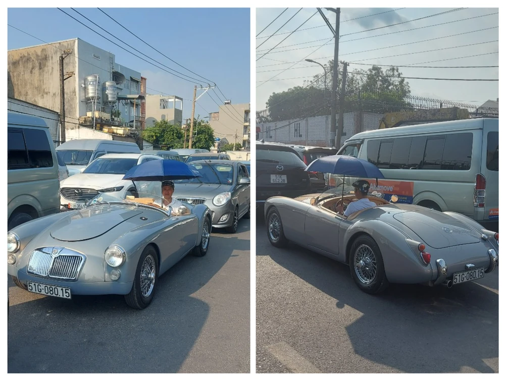 Hình ảnh anh Dương Xuân, người đang cầm dù, xếp hàng đợi tới lượt đăng kiểm. Ảnh: CTV.