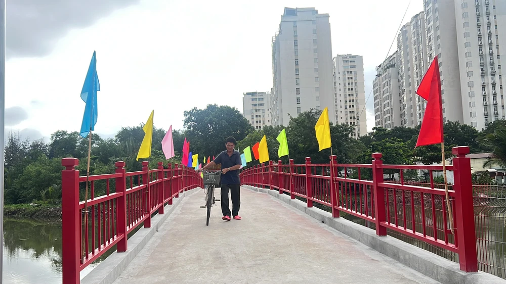 Cầu mới sau khi được nâng cấp, mở rộng. Ảnh: ĐT