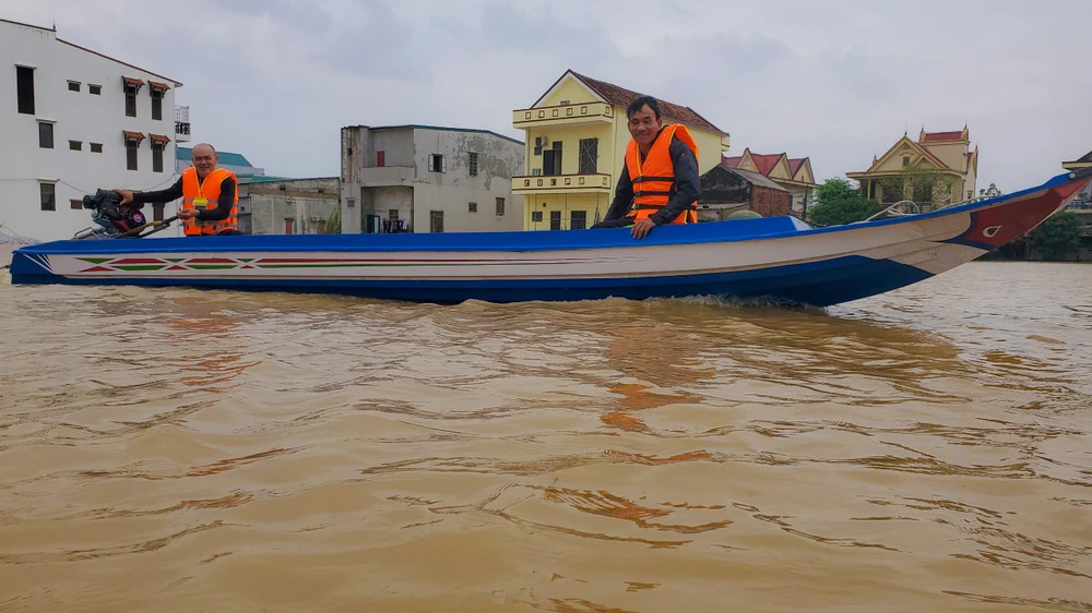 Theo người dân huyện Lệ Thuỷ thì đây là đợt lũ vừa phải, không phải lũ lớn như mọi năm. Ảnh: BT