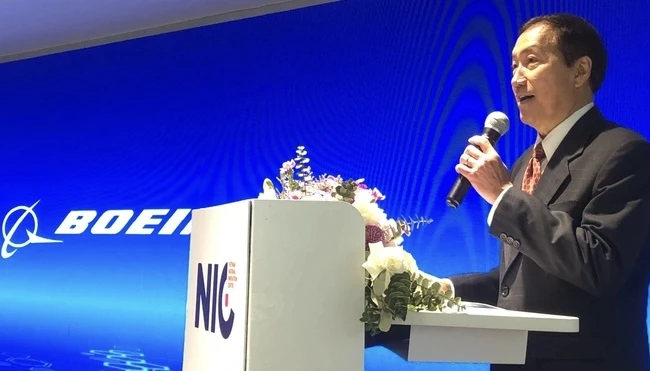 Ông Michael Vũ Nguyễn - Tổng giám đốc Boeing Việt Nam trình bày ý kiến tại hội thảo. Ảnh: MIP