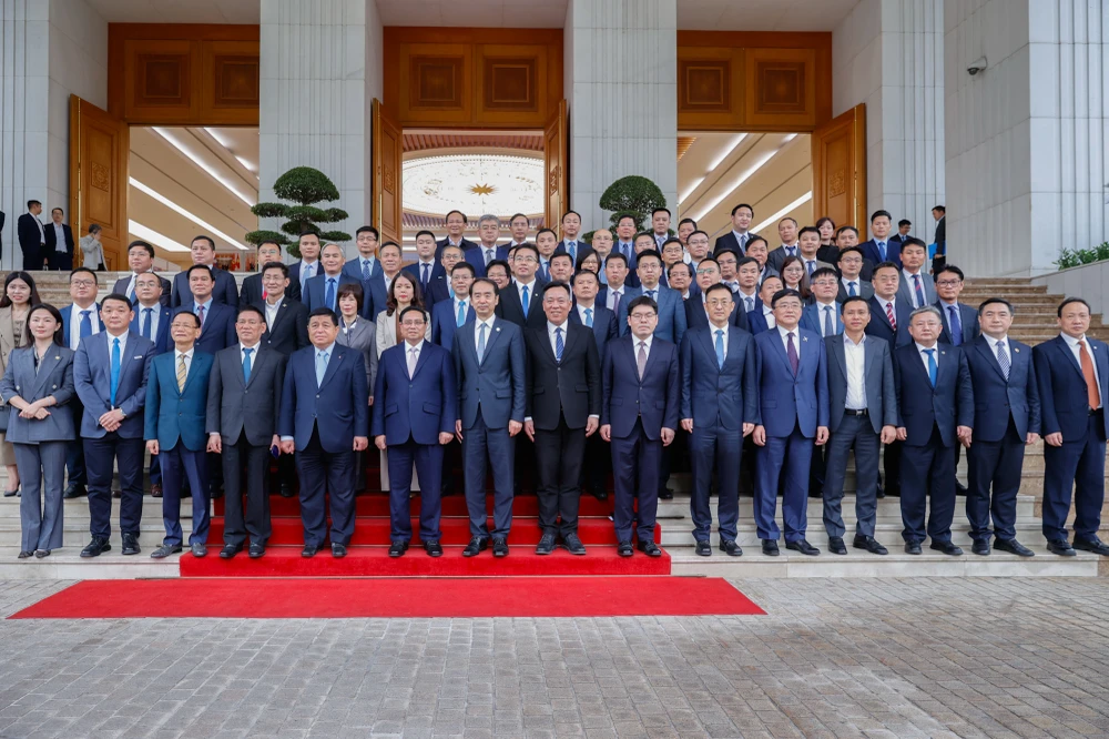 Thủ tướng đề nghị các tập đoàn lớn của Trung Quốc lấy Việt Nam làm cứ điểm sản xuất, kinh doanh. Ảnh: VGP/Nhật Bắc