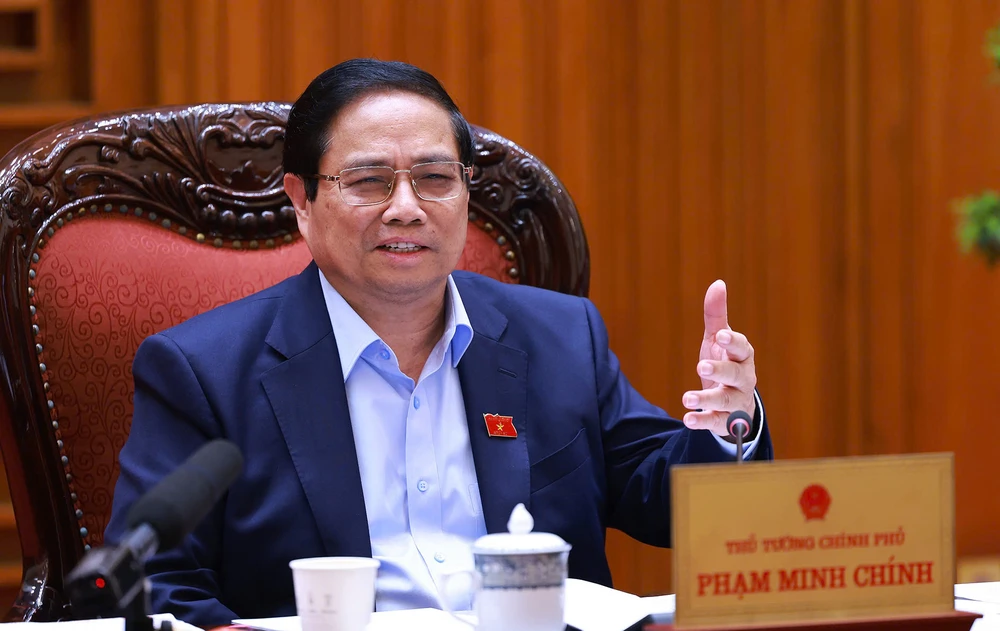 Thủ tướng nhấn mạnh việc xây dựng Trung tâm tài chính quốc tế tại Việt Nam phải quyết tâm thực hiện bằng được.