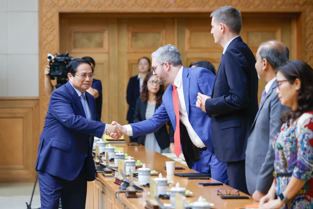 Thủ tướng Phạm Minh Chính làm việc với đại diện cộng đồng doanh nghiệp Mỹ đang đầu tư, kinh doanh tại Việt Nam. Ảnh: VGP