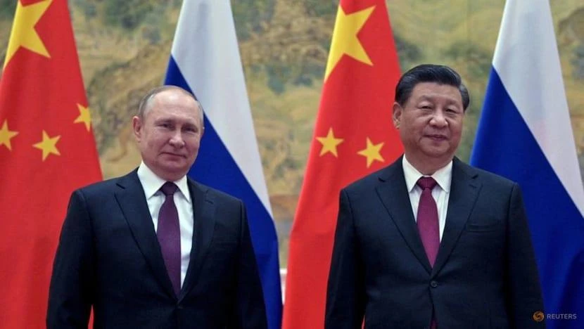 Tổng thống Nga Vladimir Putin (trái) và Chủ tịch Trung Quốc Tập Cận Bình. Ảnh: REUTERS