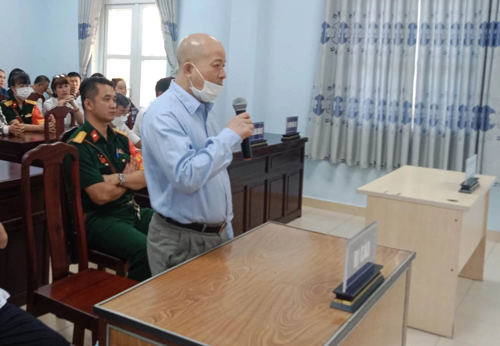 Ông Định Ngọc Hệ đang thi hành bản án chung thân, nay tiếp tục bị xét xử về tội trốn thuế. Ảnh: HĐ