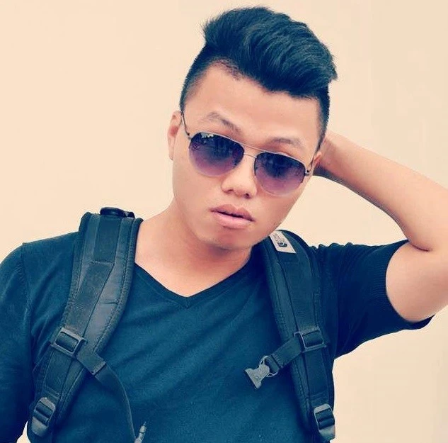 Câu like Facebook, chàng trai Hà Nội phải tạo tóc quả dứa