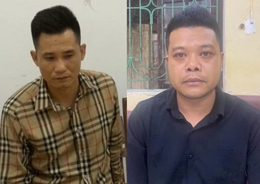 Hai nghi phạm hung hăng đánh người sau va chạm ô tô. Ảnh: H.H