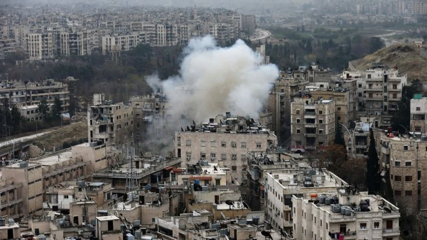 Khu vực phe nổi dậy kiểm soát ở Aleppo bị không kích ngày 5-12. Ảnh: AP 