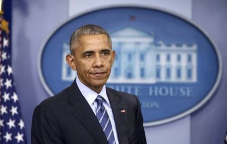 Tổng thống Obama họp báo tại Nhà trắng ngày 16-12. Ảnh: REUTERS 
