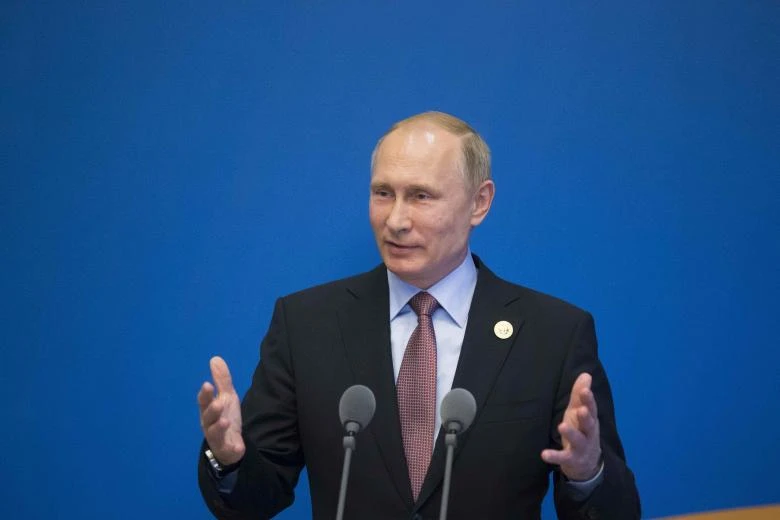 Tổng thống Nga Vladimir Putin họp báo sau khi tham gia Diễn đàn Vành đai và Con đường ở Bắc Kinh (Trung Quốc) ngày 15-5. Ảnh: REUTERS