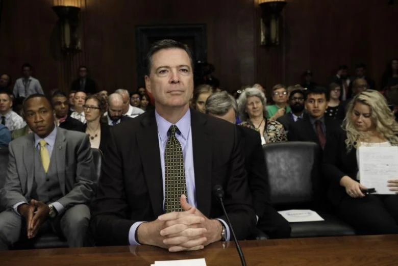 Giám đốc FBI James Comey trong cuộc điều trần trước Quốc hội ngày 3-5, 6 ngày trước khi bị ông Trump sa thải. Ảnh: REUTERS