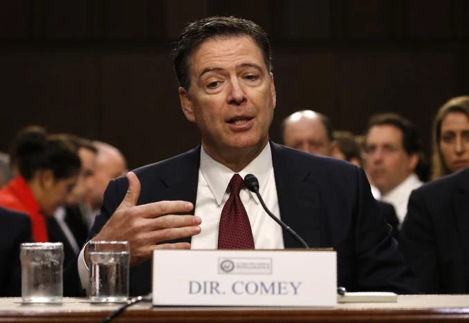 Ông Comey tại cuộc điều trần. Ảnh: REUTERS