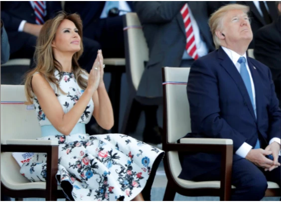 Vợ chồng Tổng thống Trump tham dự lễ diễu binh. Ảnh: REUTERS