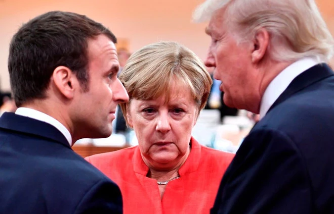 Tổng thống Mỹ Donald Trump (phải) đã điện đàm với Thủ tướng Đức Angelar Merkel (giữa) và Tổng thống Pháp Emmanuel Macron (trái) về tuyên bố hạt nhân cứng rắn của Tổng thống Nga Vladimir Putin. Ảnh: GETTY IMAGES