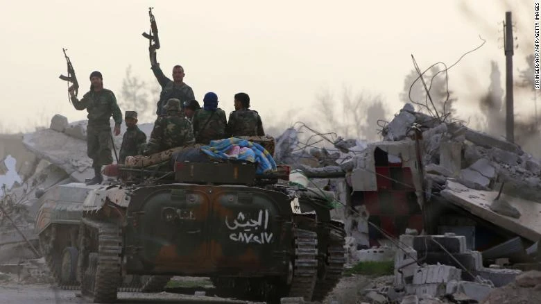 Binh sĩ Syria tiến vào Đông Ghouta. Ảnh: CNN