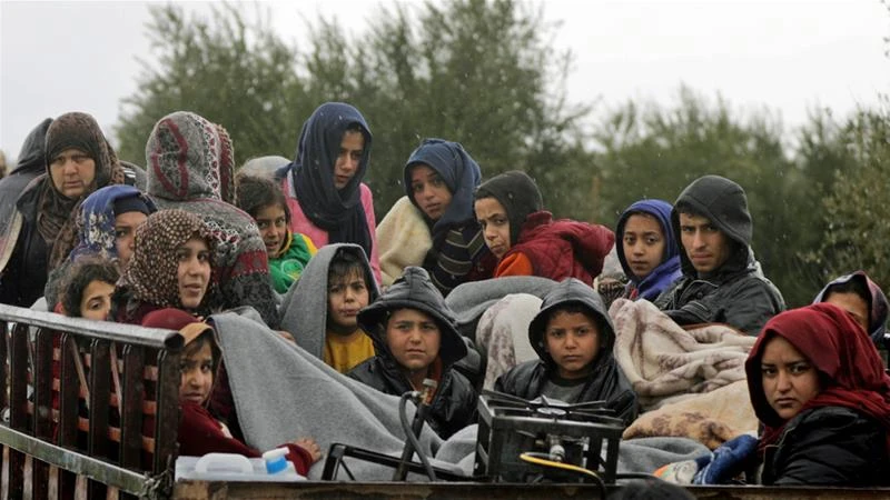 Người dân Afrin sơ tán ngày 15-3. Ảnh: REUTERS