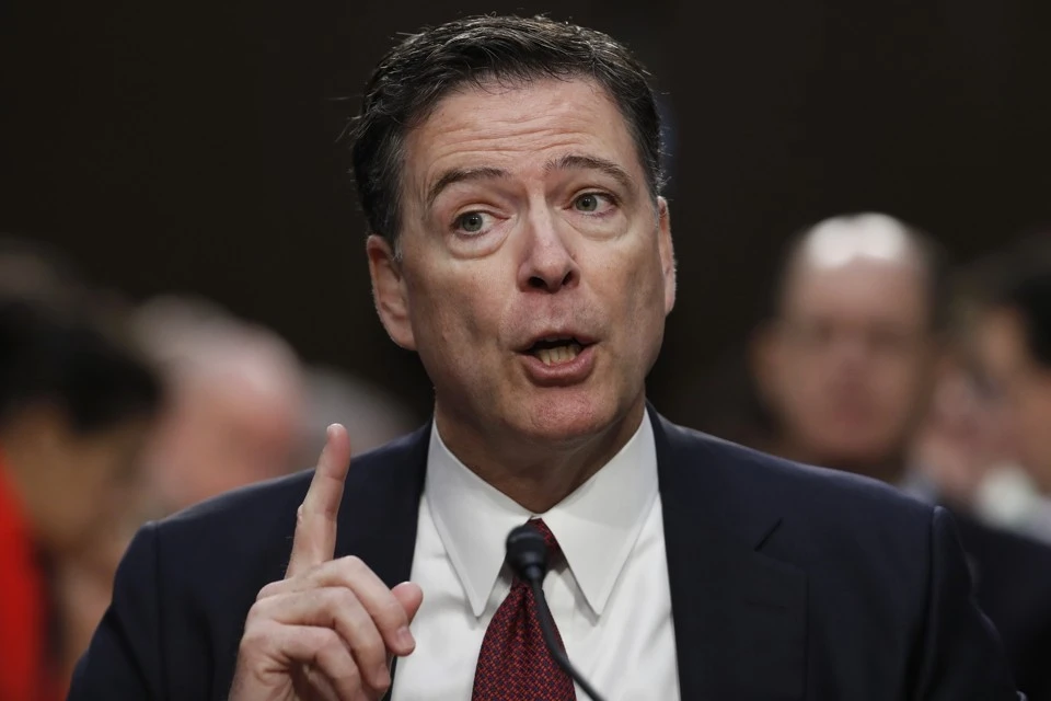 Giám đốc FBI James Comey bị ông Trump sa thải tháng 5-2017. Ảnh: AP