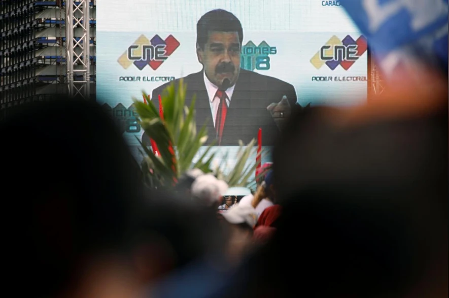 Tổng thống Venezuela Nicolas Maduro phát biểu với người ủng hộ qua truyền hình sau khi được Ủy ban bầu cử xác nhận kết quả ông chiến thắng trong cuộc bầu cử ngày 20-5. Ảnh: REUTERS