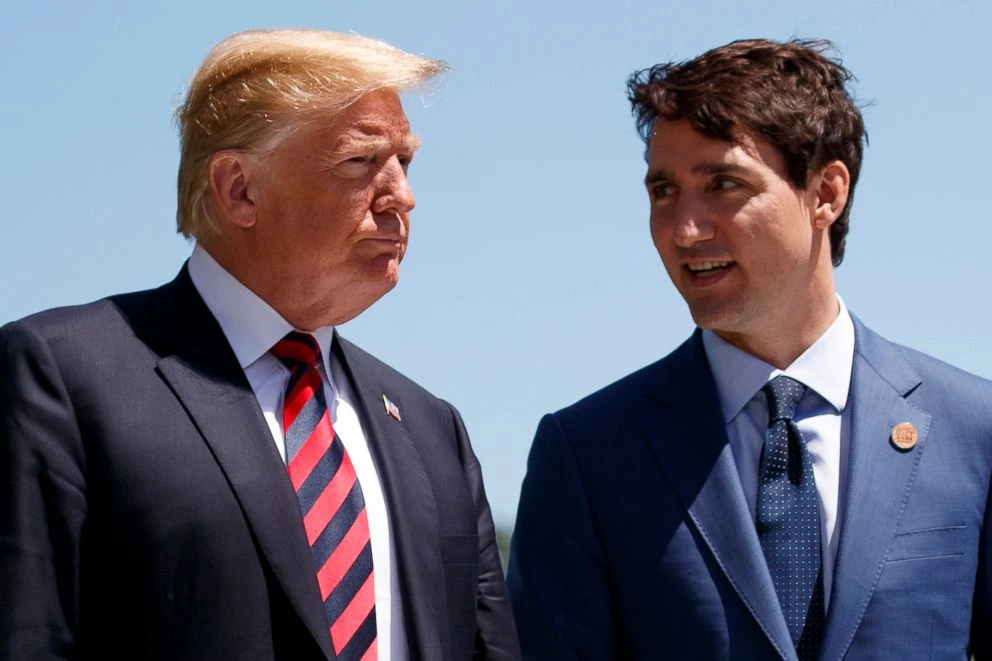 Tổng thống Mỹ Donald Trump (trái) và Thủ tướng Canada Justin Trudeau tại hội nghị G7 ở Canada ngày 8-7. Ảnh: REUTERS