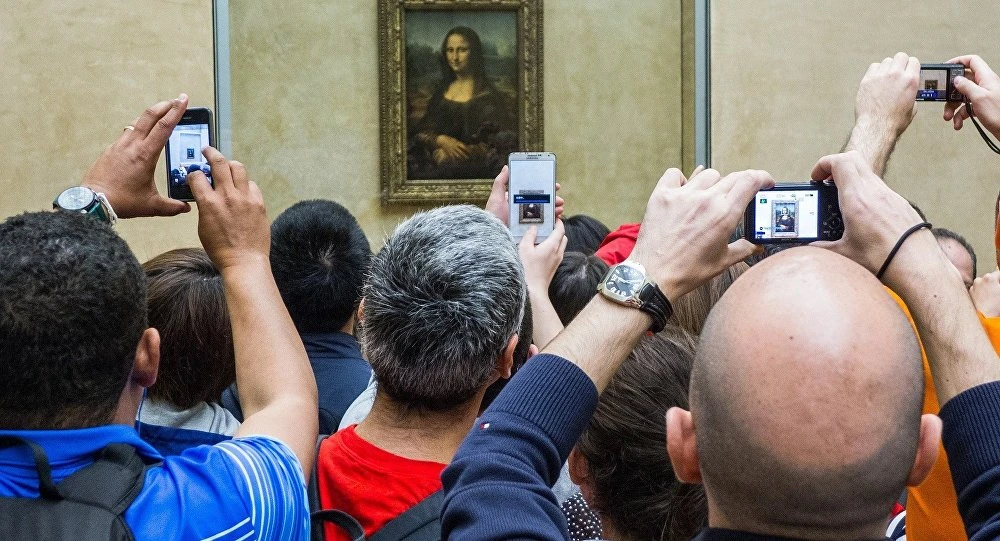 Bức tranh nàng Mona Lisa đang được trưng bày tại bảo tàng Louvre ở Paris (Pháp). Ảnh: SPUTNIK