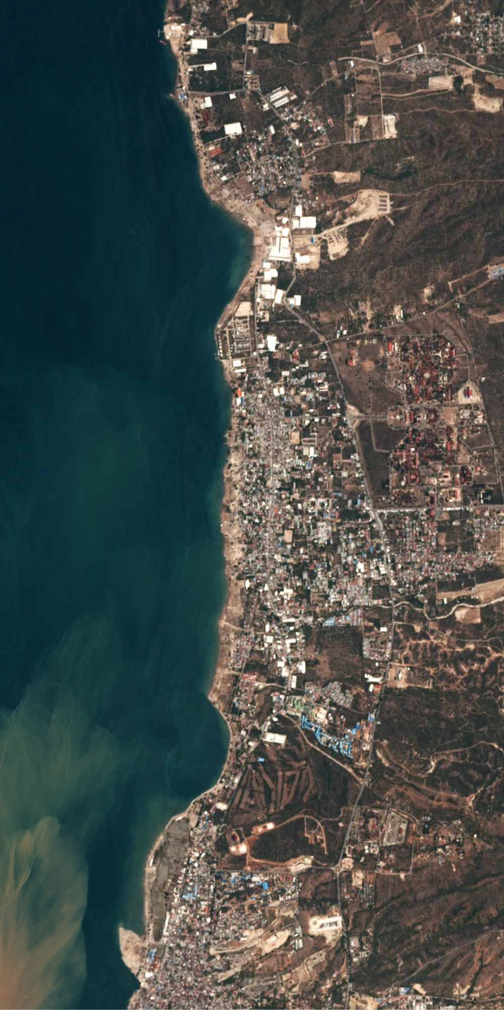 Palu sau khi thảm họa ập vào. Ảnh: PLANET